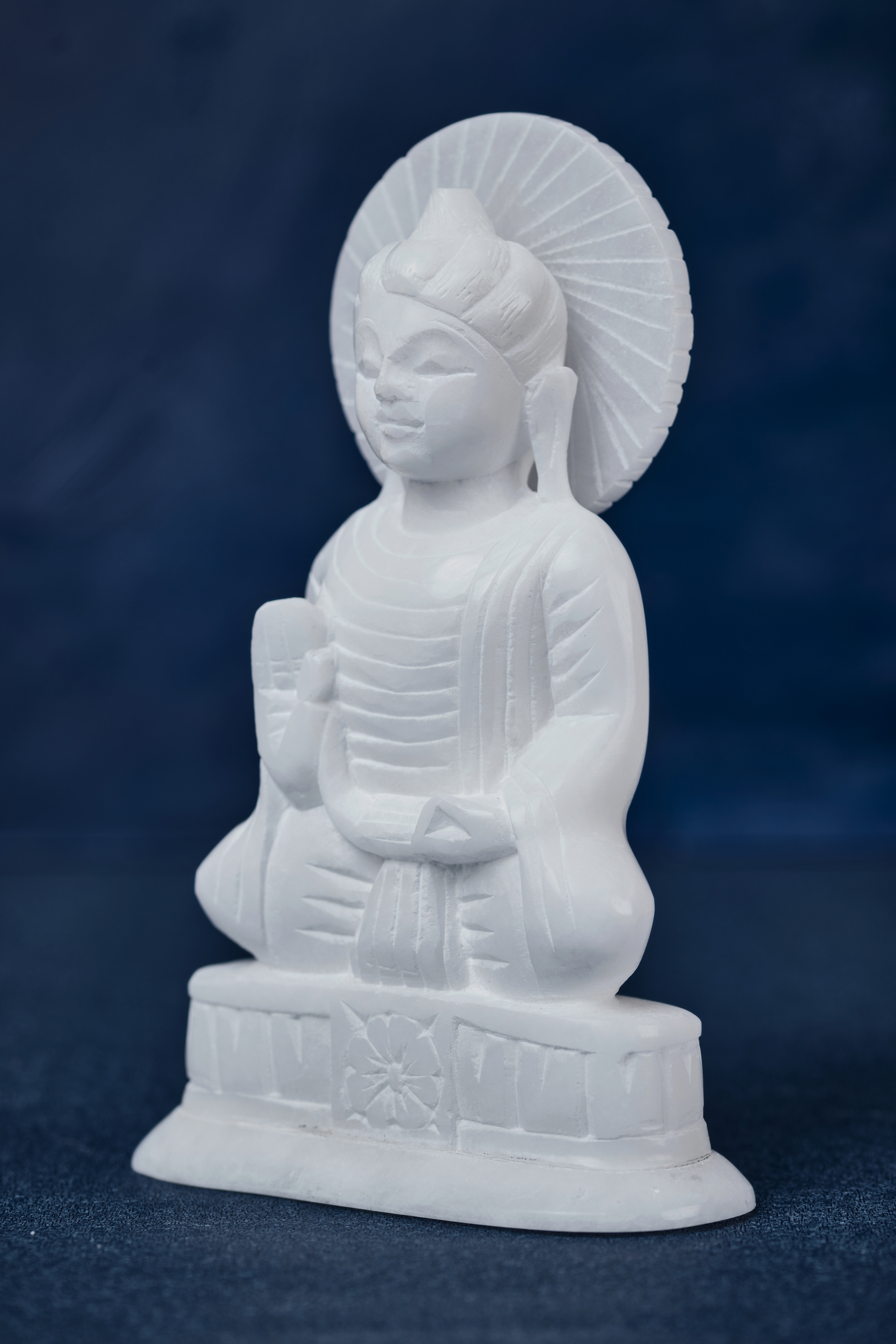 White Stone Buddha With 'Dharma' Wheel