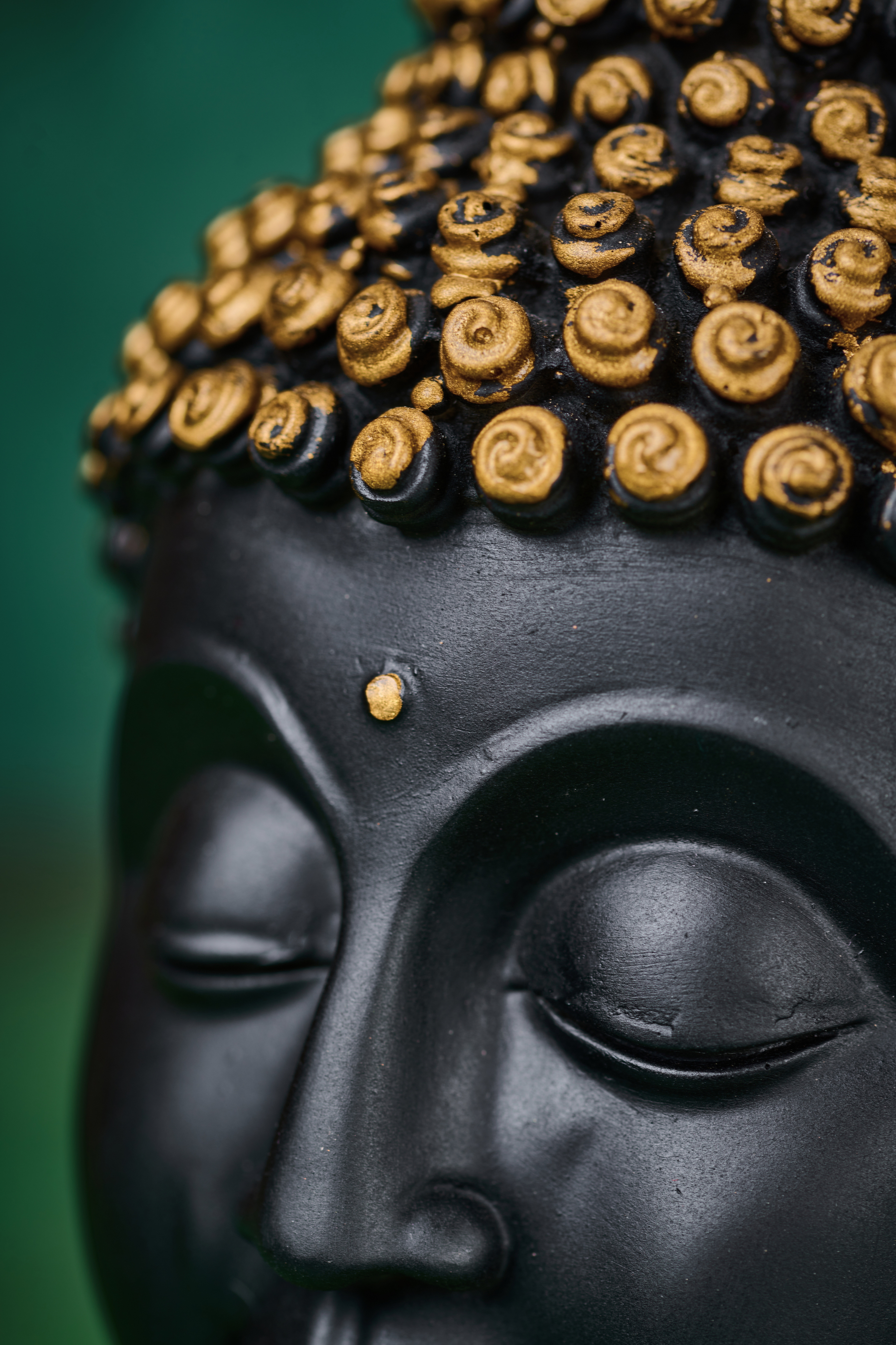 Black wooden Buddha head