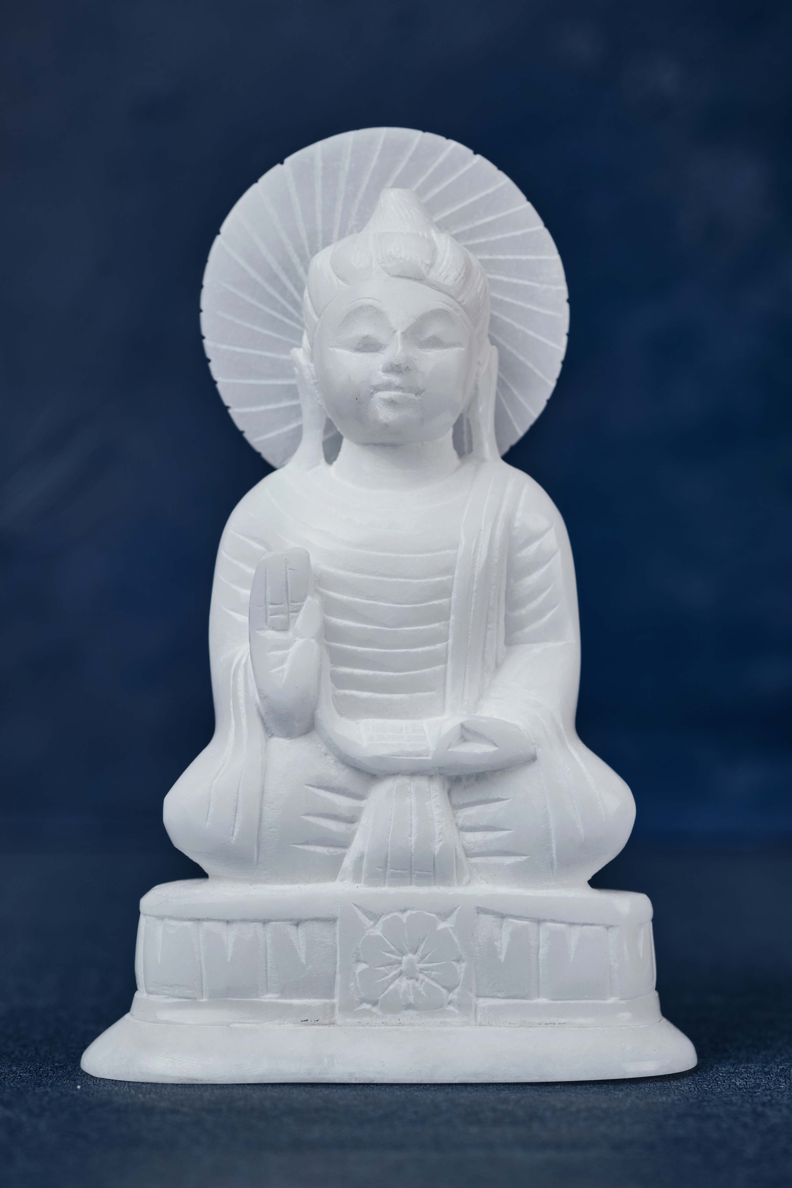 White Stone Buddha With 'Dharma' Wheel