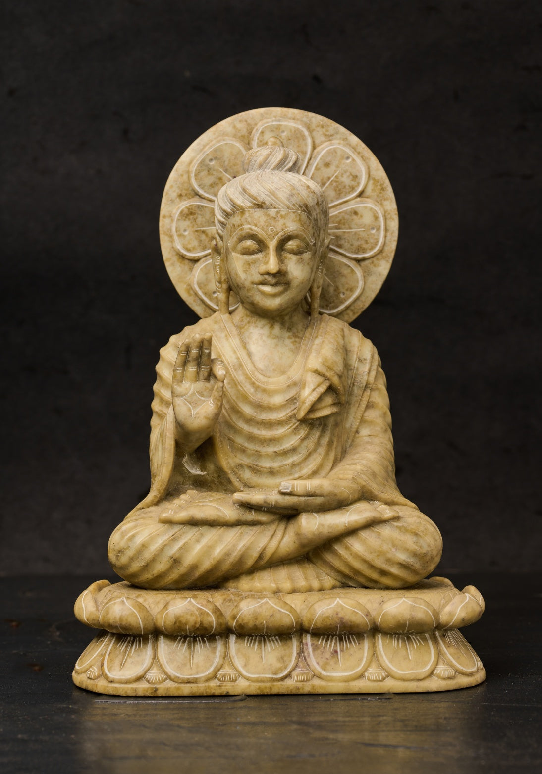 Green Stone Carved Sitting Buddha