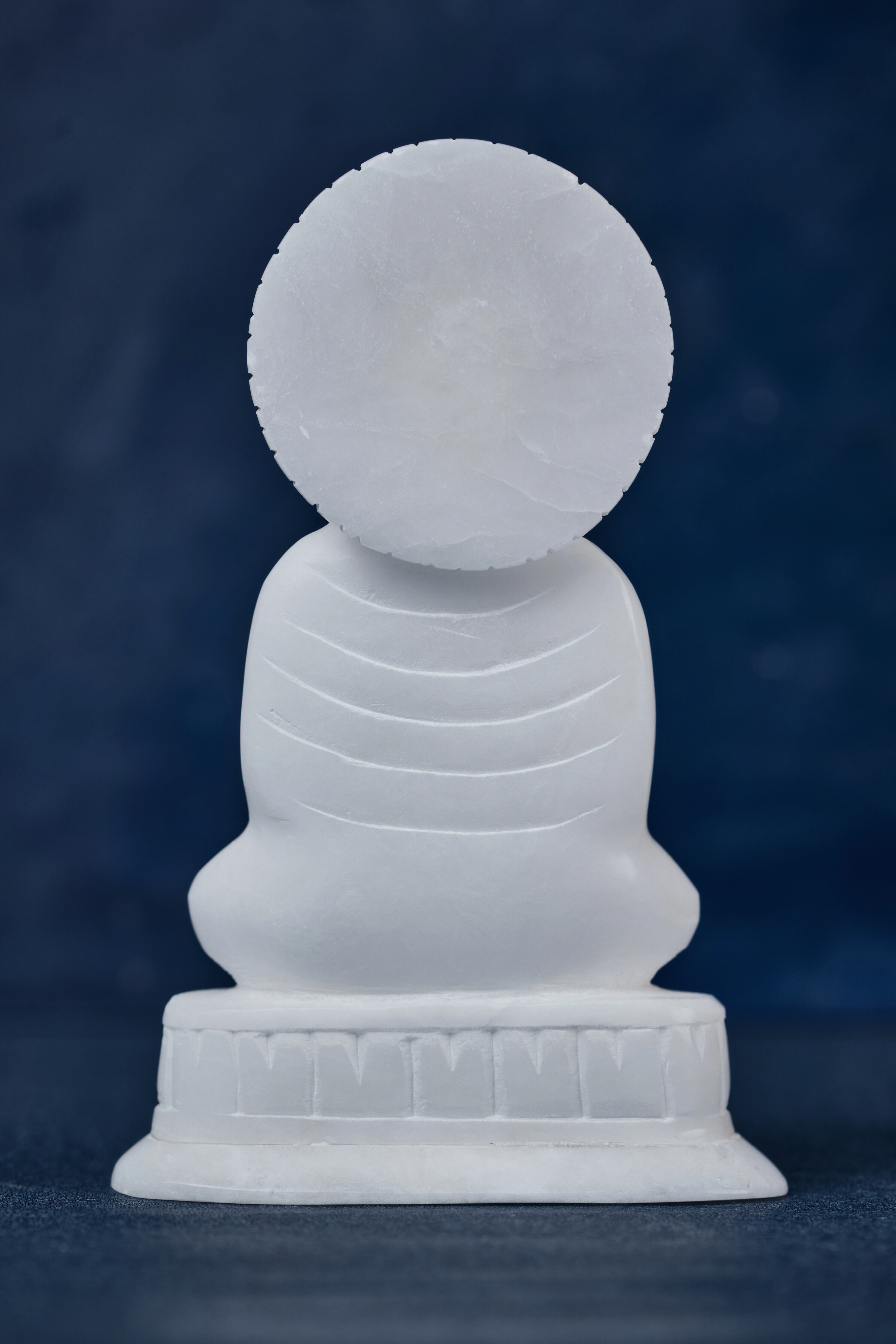 White Stone Buddha With 'Dharma' Wheel