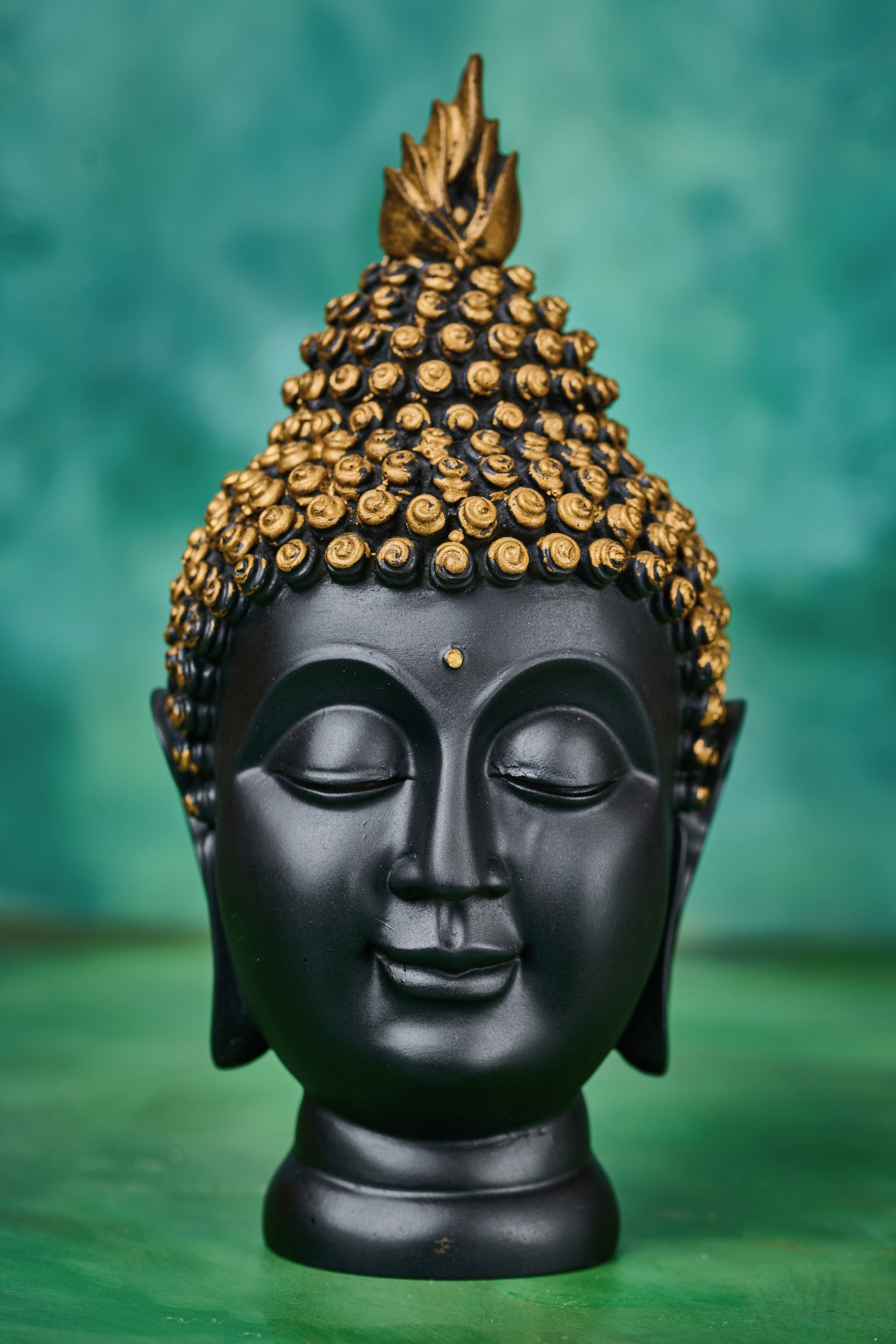 Black wooden Buddha head