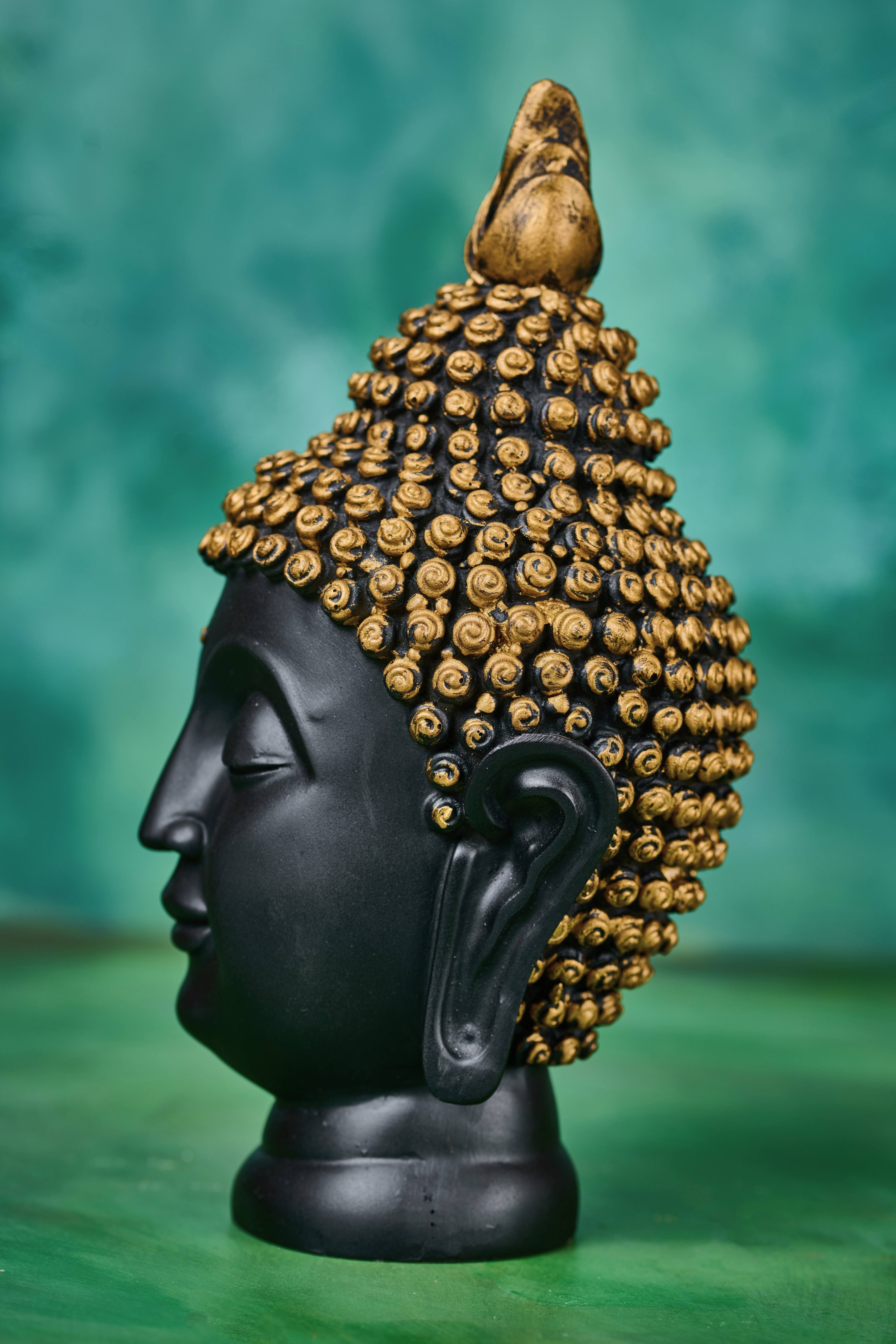 Black wooden Buddha head