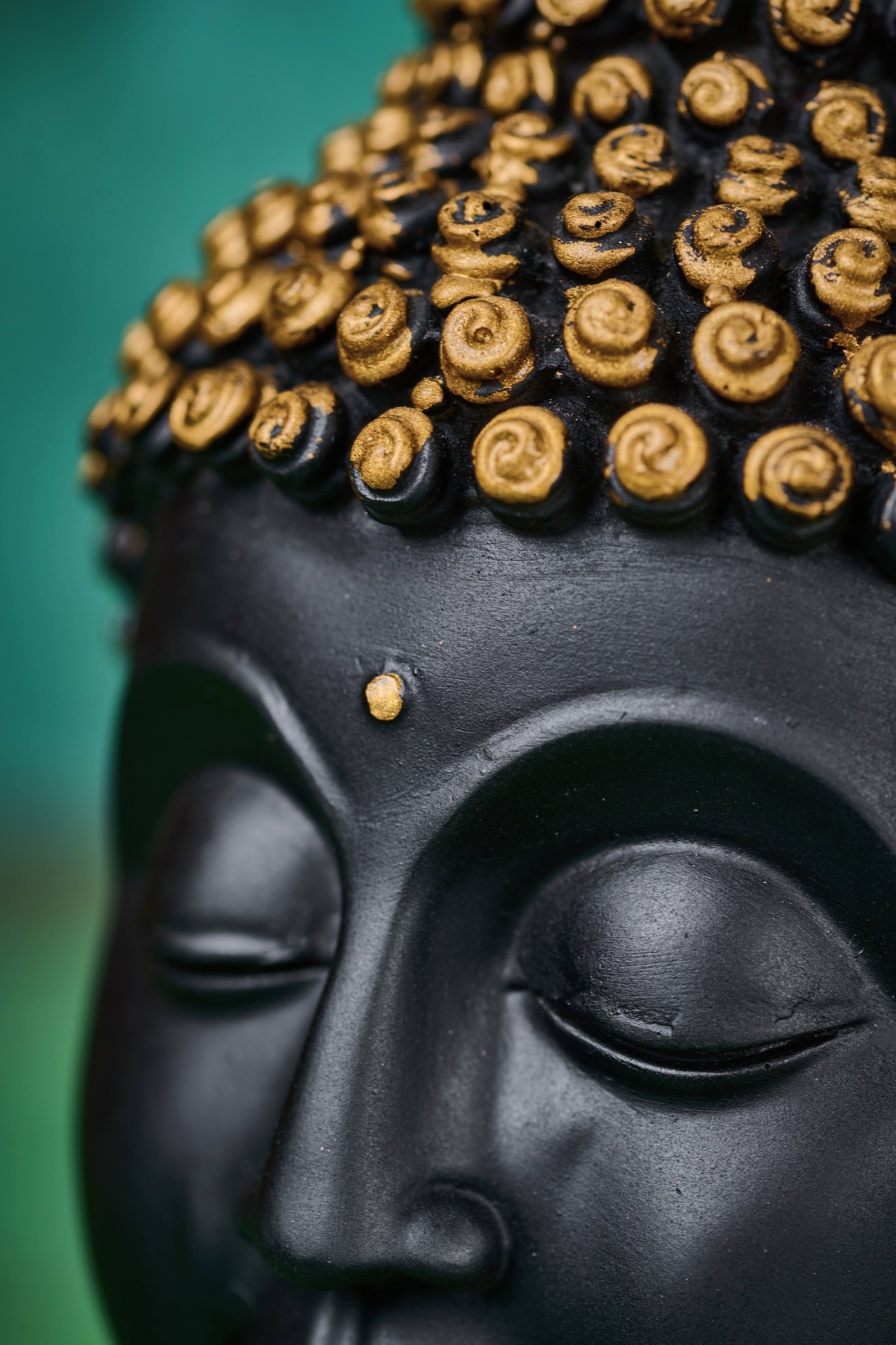 Black wooden Buddha head