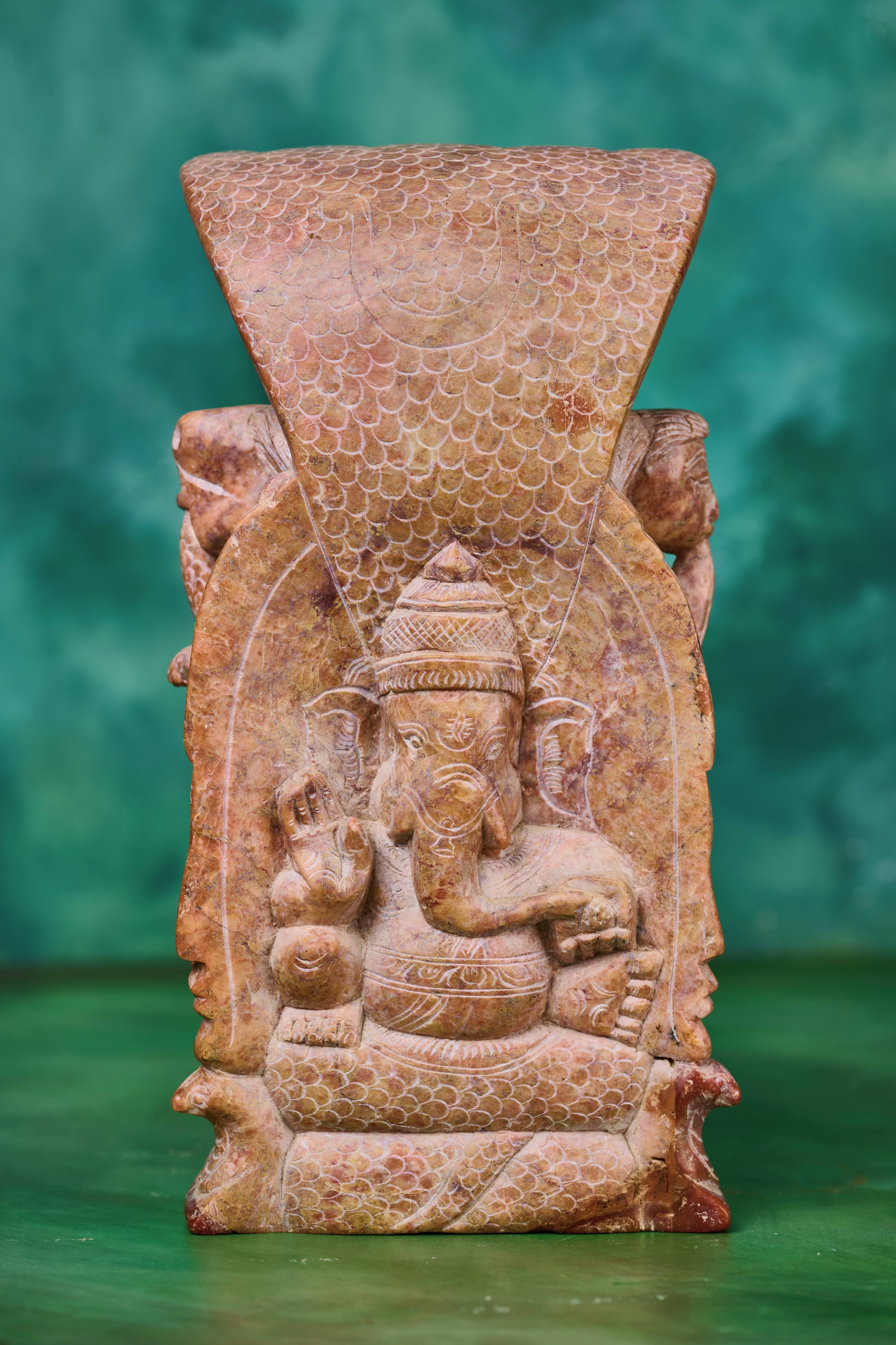 Red Stone 'Trimurti' Sculpture