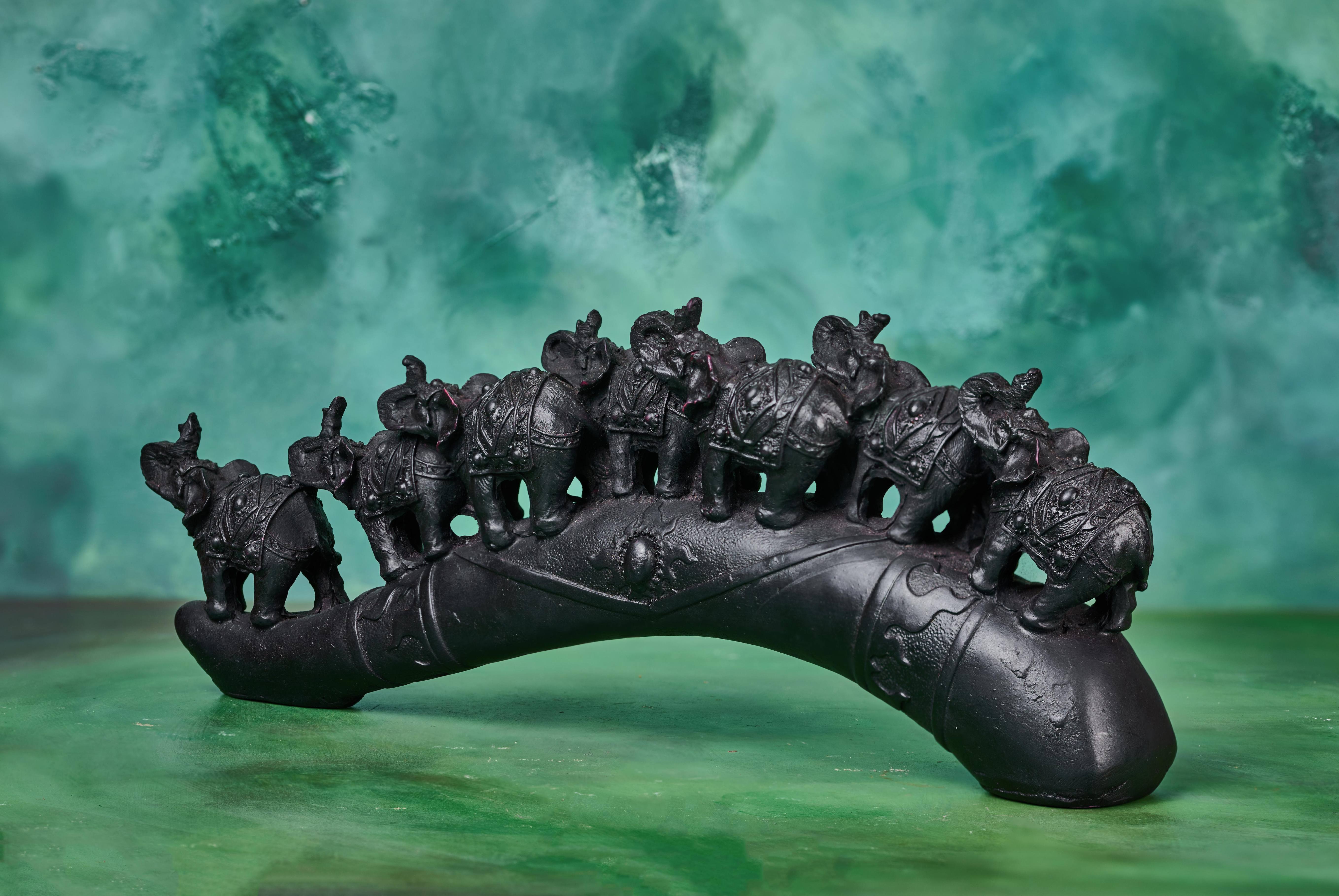 Black Elephant Tusk Sculpture